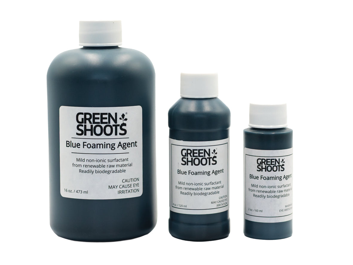 Three bottles of Green Shoots Blue Foaming Agent on a white background